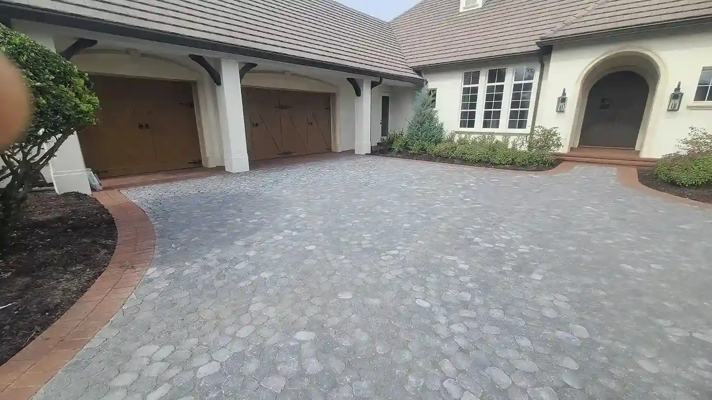 Paver driveway installed by Alliance Pavers in a Central Florida neighborhood