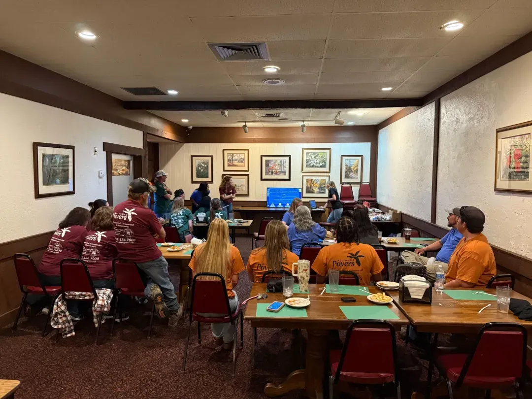 Alliance Pavers staff gathered for a team meeting and lunch.