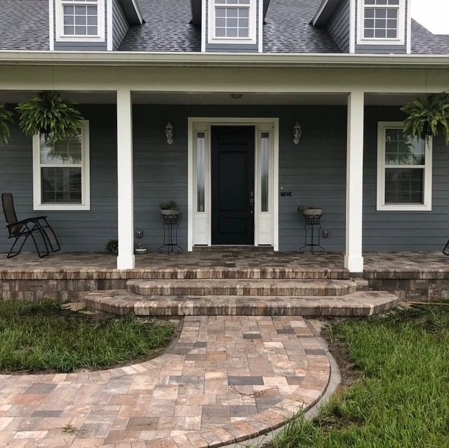 Paver walkway and front porch — the kind of project Alliance Pavers builds in Kissimmee, FL