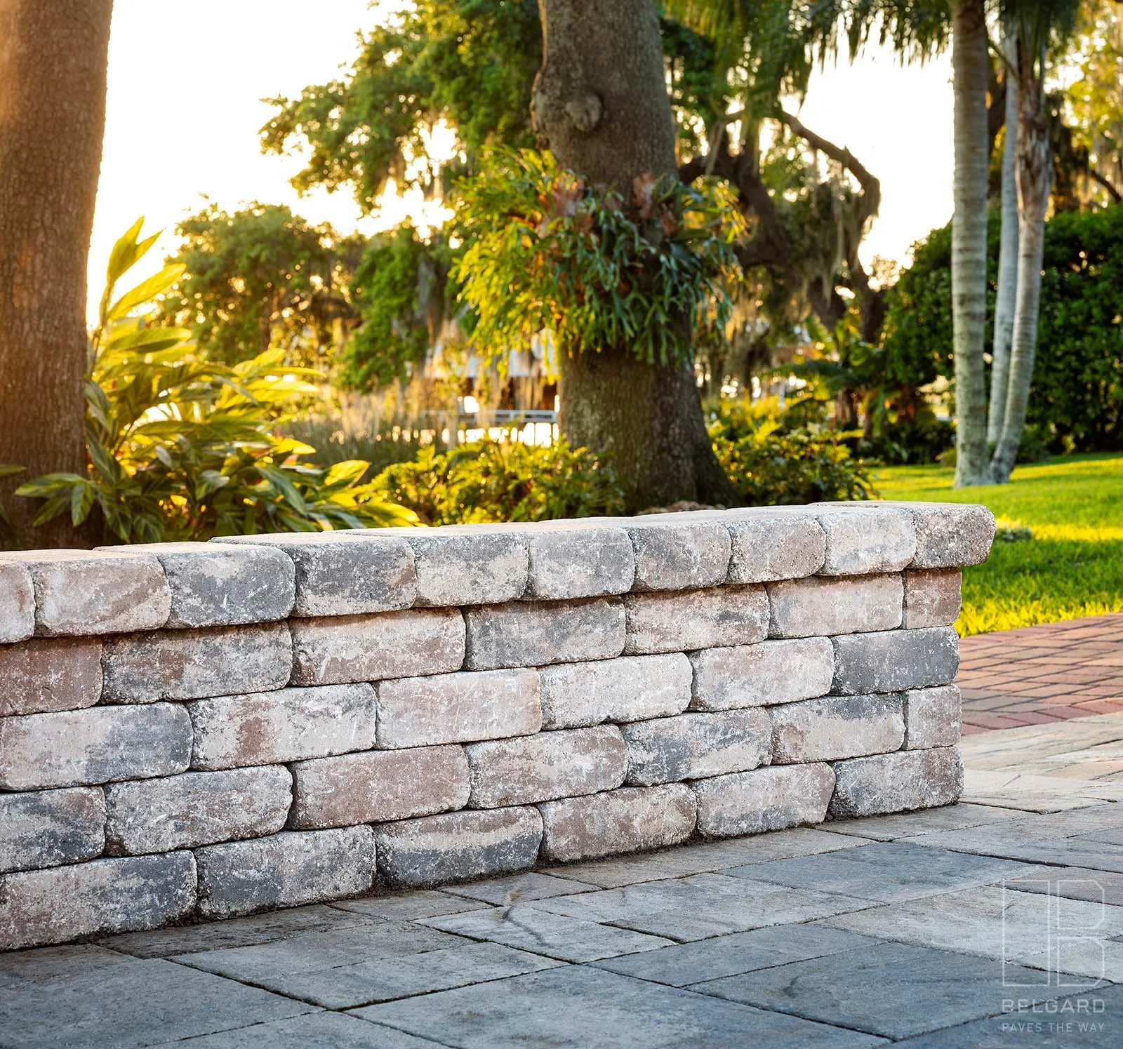 Natural stone retaining wall in golden evening light